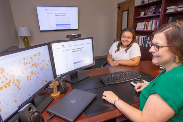 Picture of people analyzing data