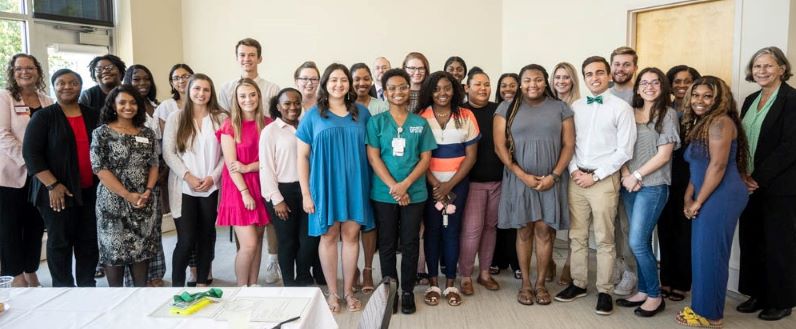 photo of student scholars gathered together