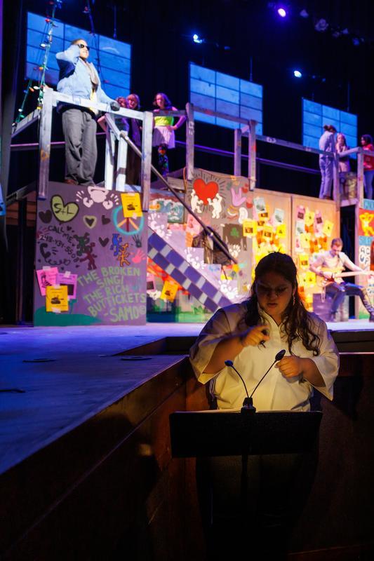 312A6671.CR3 Joelle Mariano-Ramos signs during Upstate Theatre's performance of "Rent"